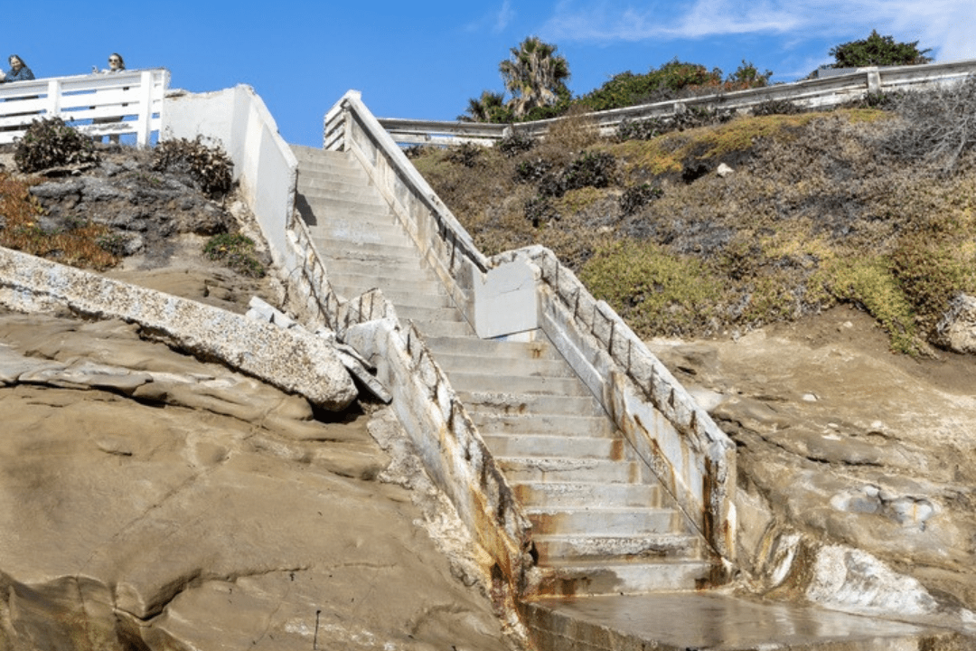 camino de la costa stairs in La Jolla that lead down tot he coast showing rust and broken steps in need of repair